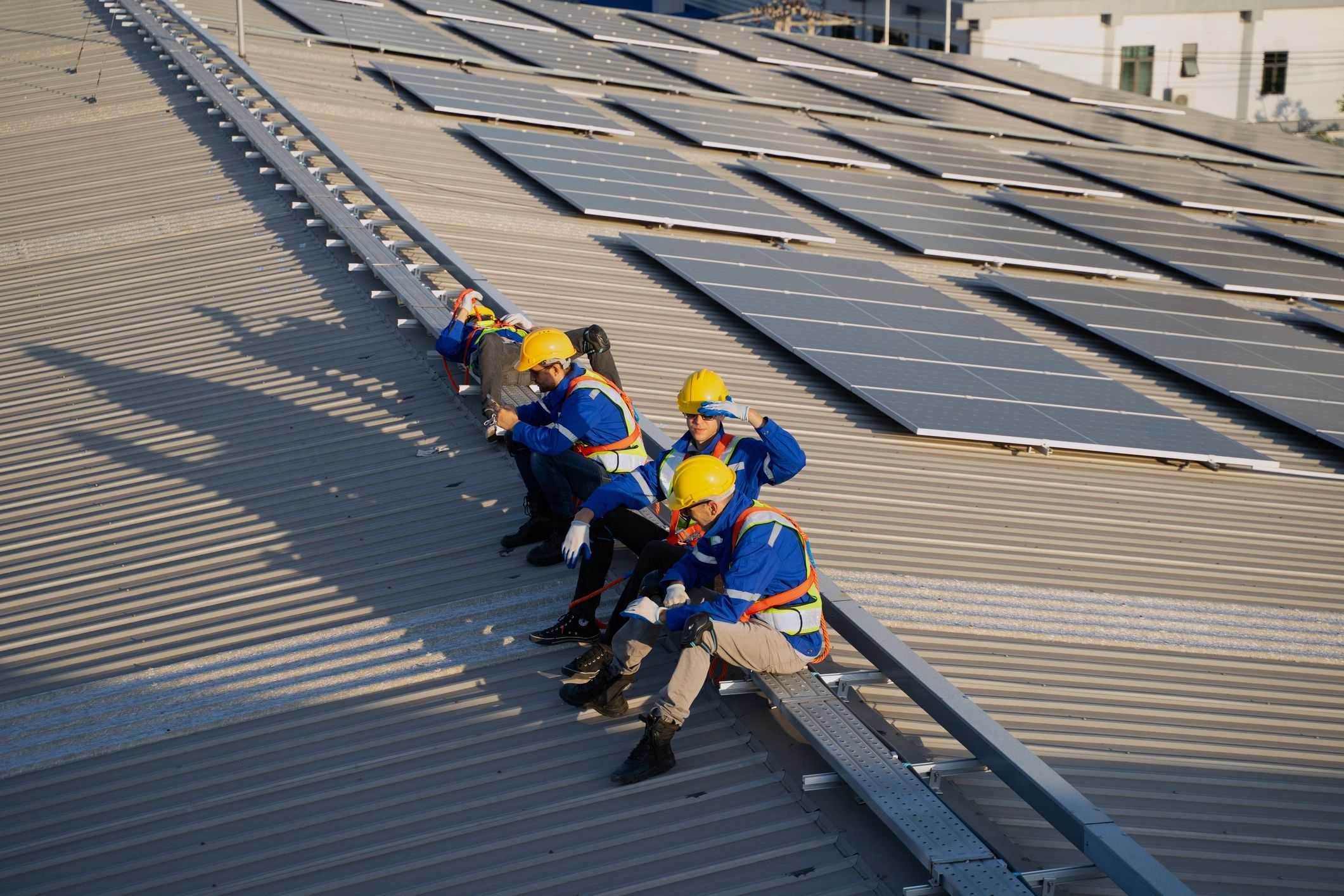 HVAC maintenance team on rooftop equipment