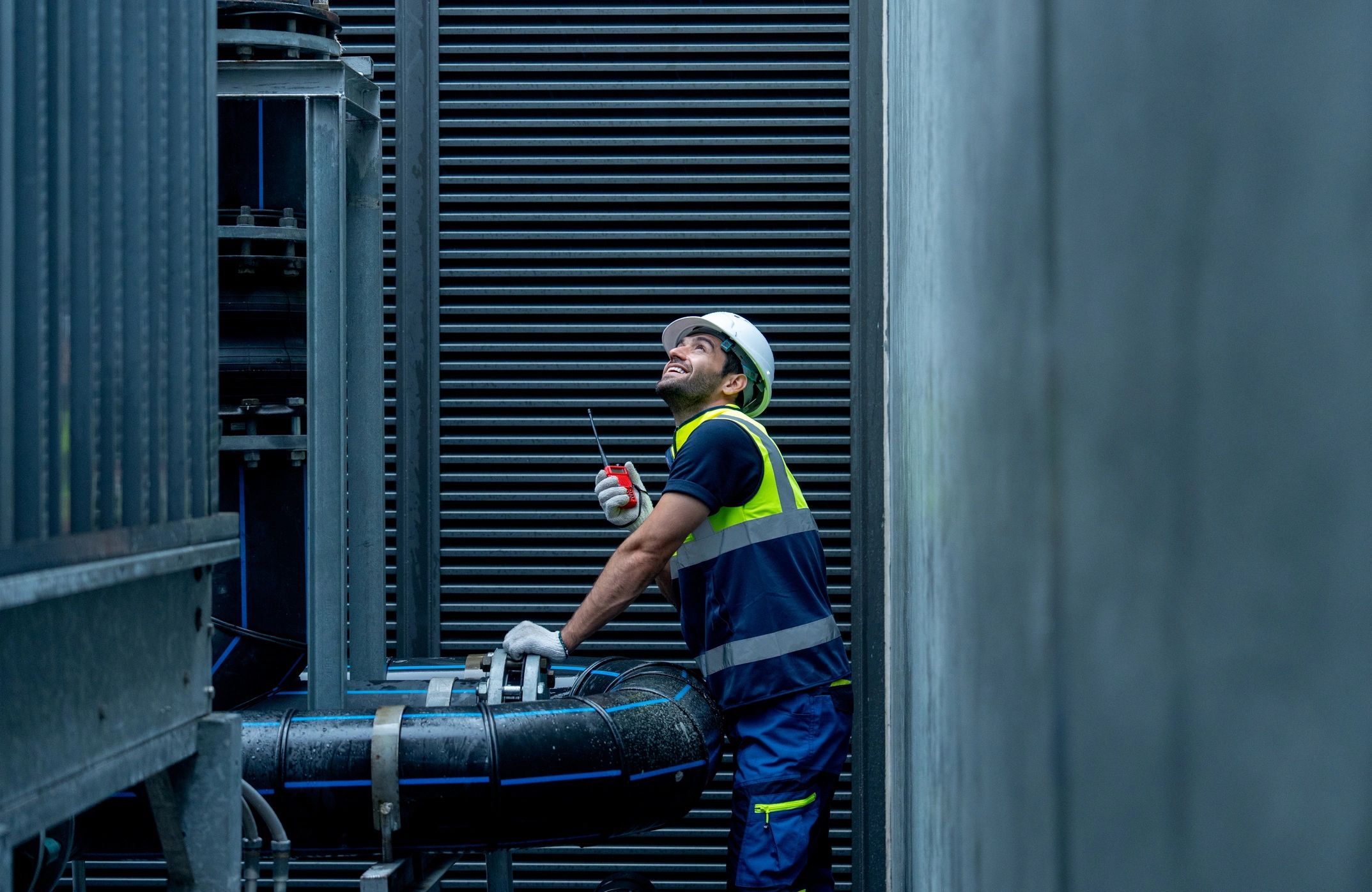 HVAC technician inspecting commercial air system
